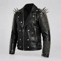 Black leather motorcycle jacket with silver metal spikes and studs on the shoulders, sleeves, and cuffs, shown against a light gray background.