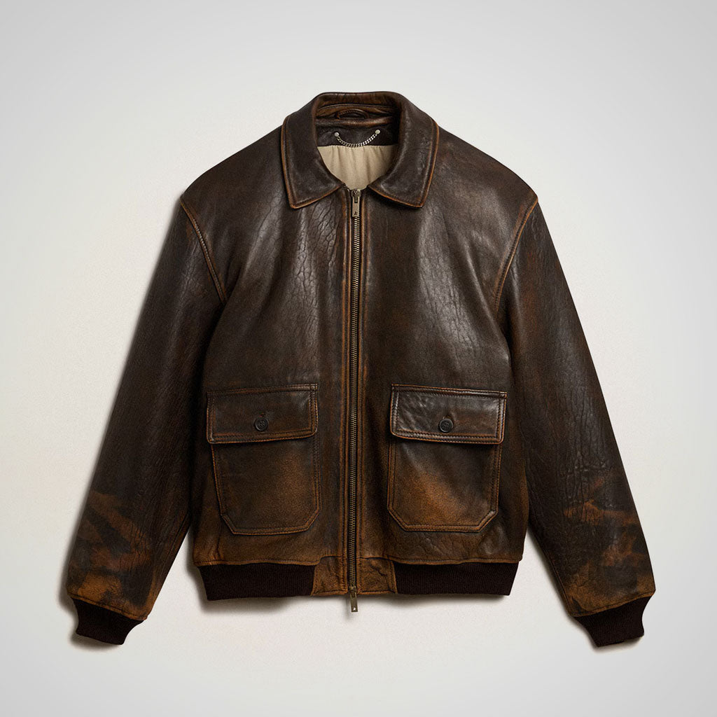 A distressed brown Vintage Pilot Jacket with a front zipper, two large flap pockets, and ribbed knit collar, cuffs, and hem, displayed against a light gray background.
