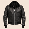 A Big and Tall Leather Bomber Jacket with a plush black shearling-style collar, front zipper, and two buttoned flap pockets, shown on a plain light beige background.