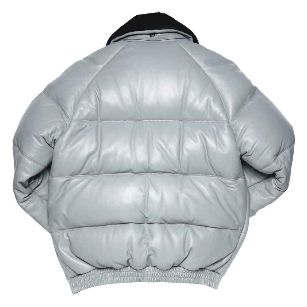 A light gray v bomber jacket with horizontal quilting, shown from the back. It features a black collar and elasticized cuffs and hem, photographed against a solid white background.