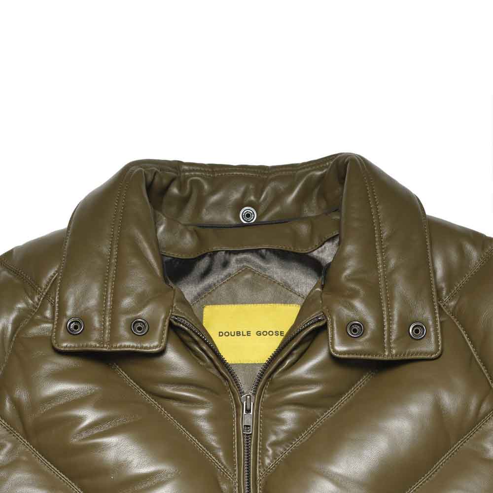 Close-up of a double goose jacket collar in khaki leather, featuring a yellow brand label and silver snap buttons.