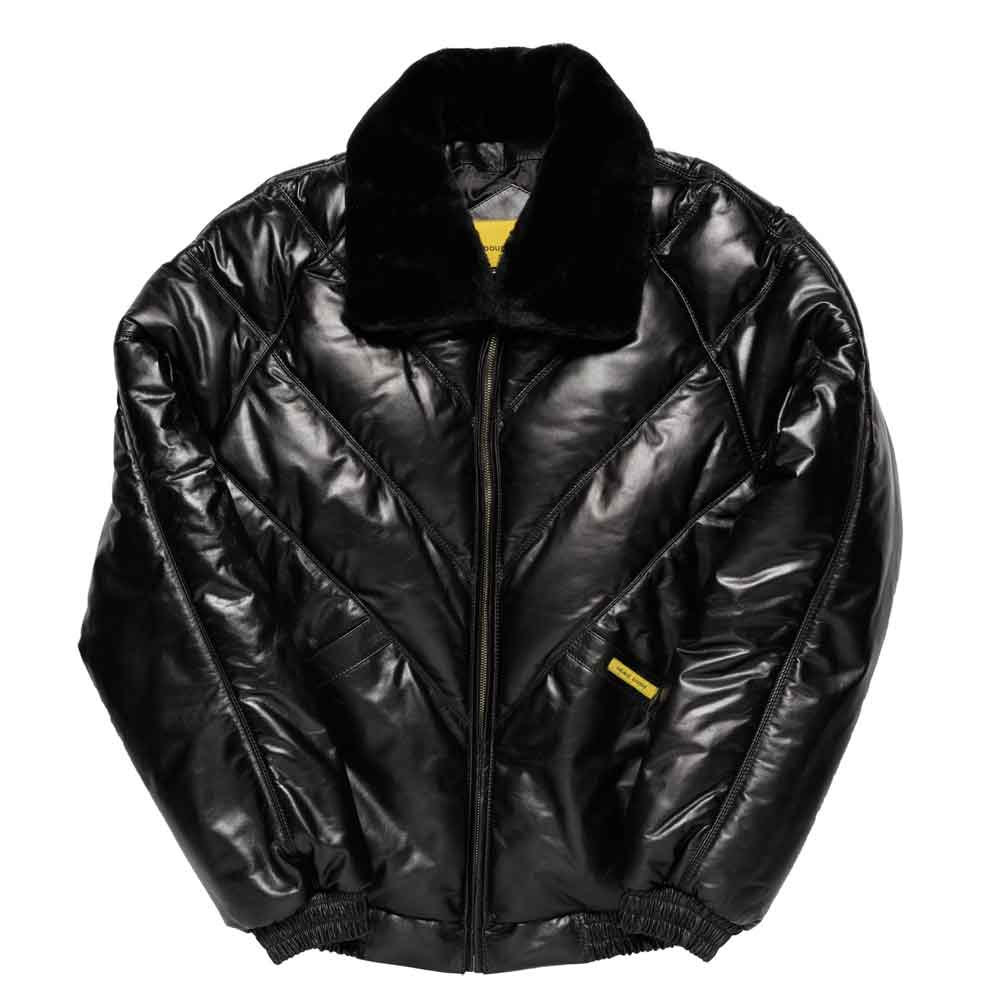 A shiny black quilted v bomber jacket with a plush black faux-fur collar, black elasticized cuffs and hem, and small yellow brand tags on the chest and collar, shown against a plain white background.
