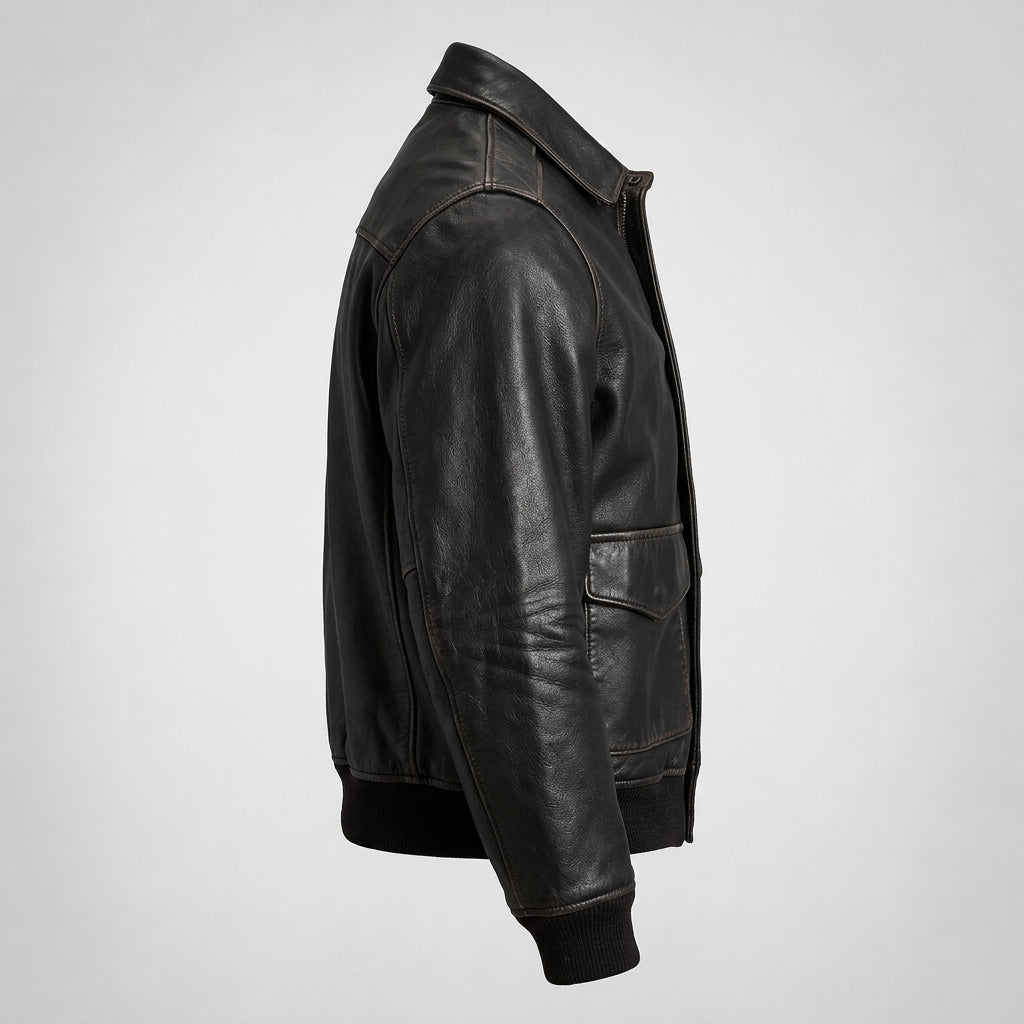 A dark brown leather jacket shown from a side profile view against a light gray studio background.