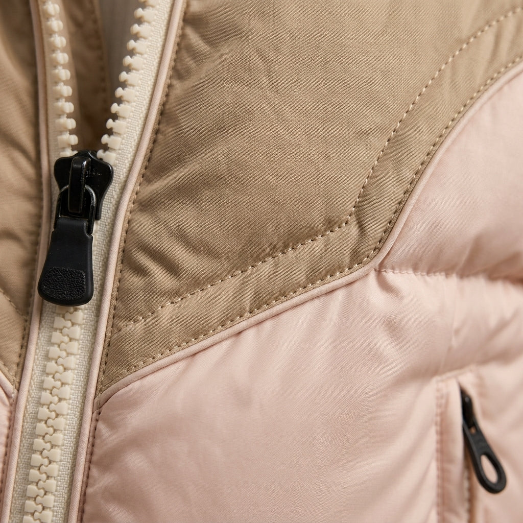 close up of a puffer jacket with zipper shown in the picture