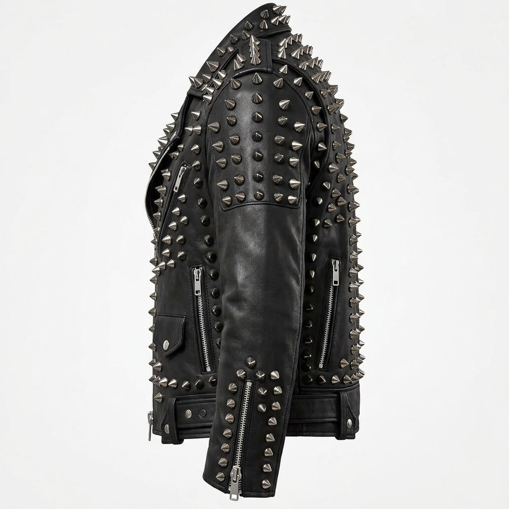 A black leather motorcycle jacket heavily embellished with silver metal spikes and zippers, shown from a side profile view against a plain white background.