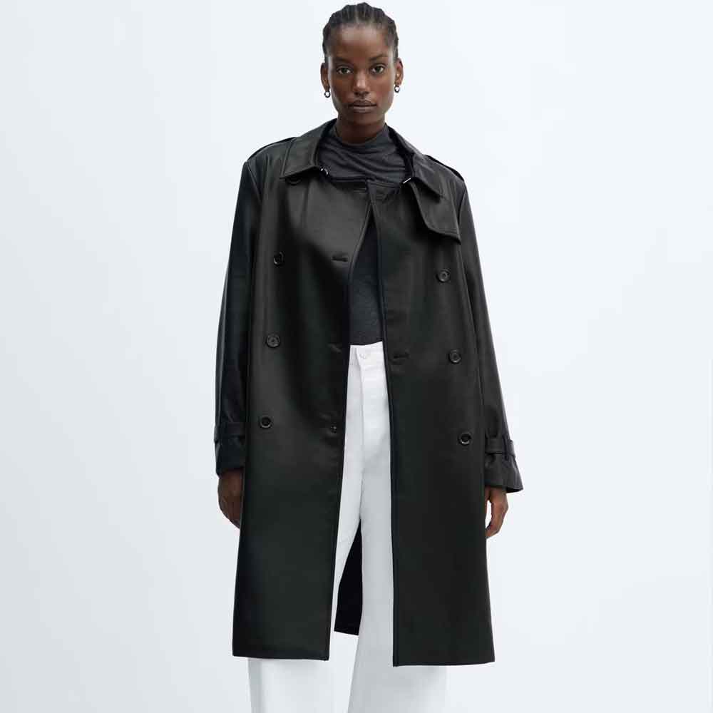 front view of a women wearing black leather trench coat