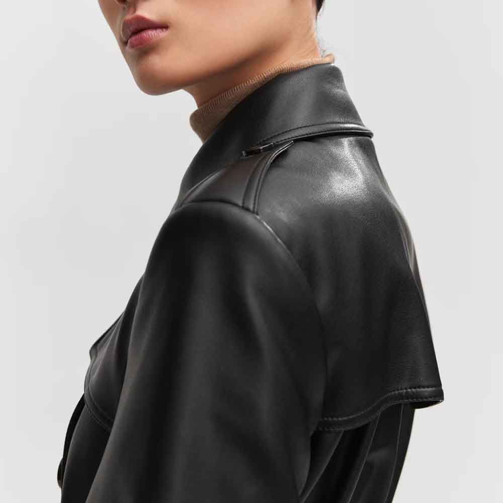 close up of a model wearing black leather coat