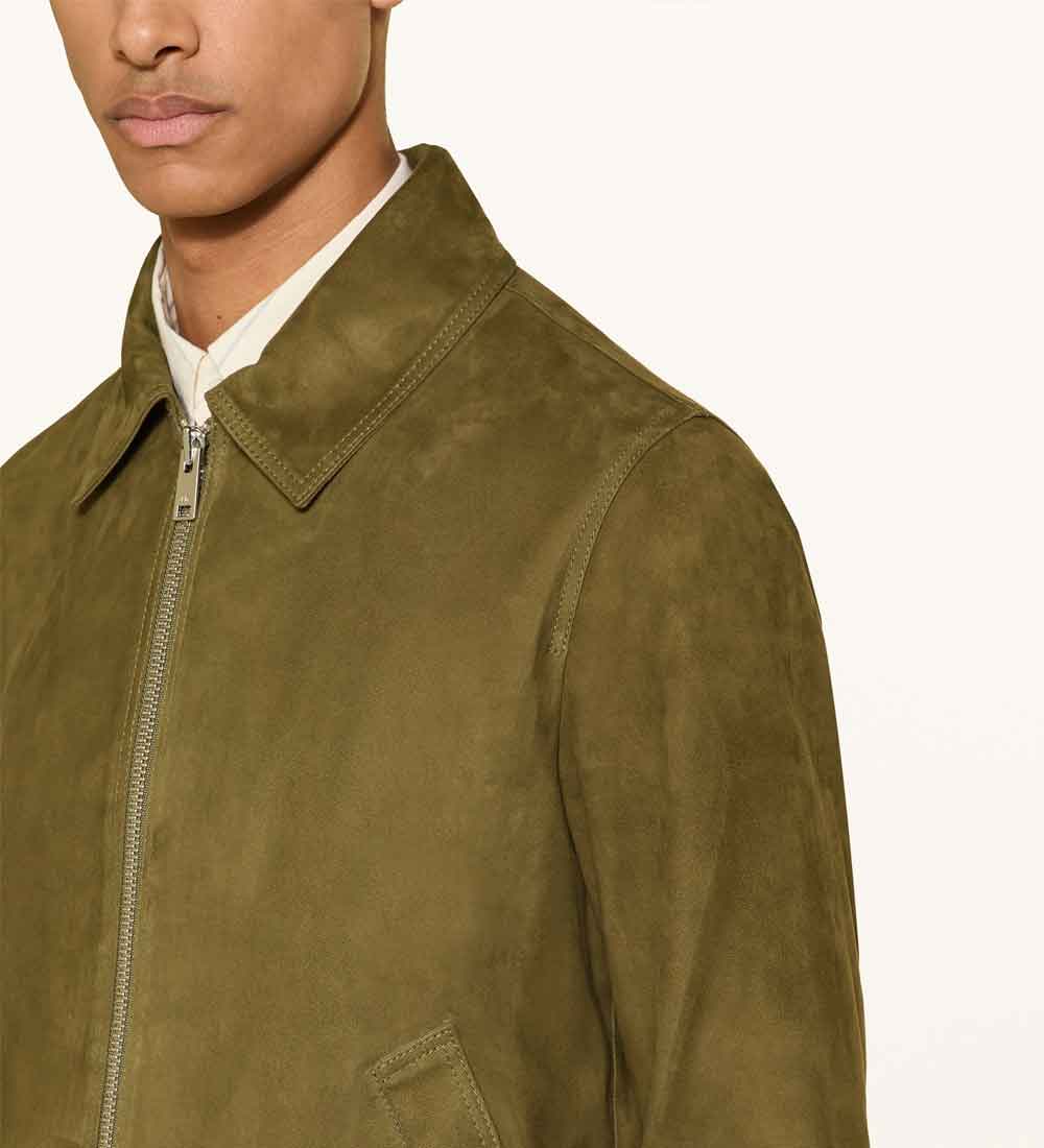 Close-up of a person wearing an Olive Bomber Jacket Men over a white collared shirt, shown against a plain light background.