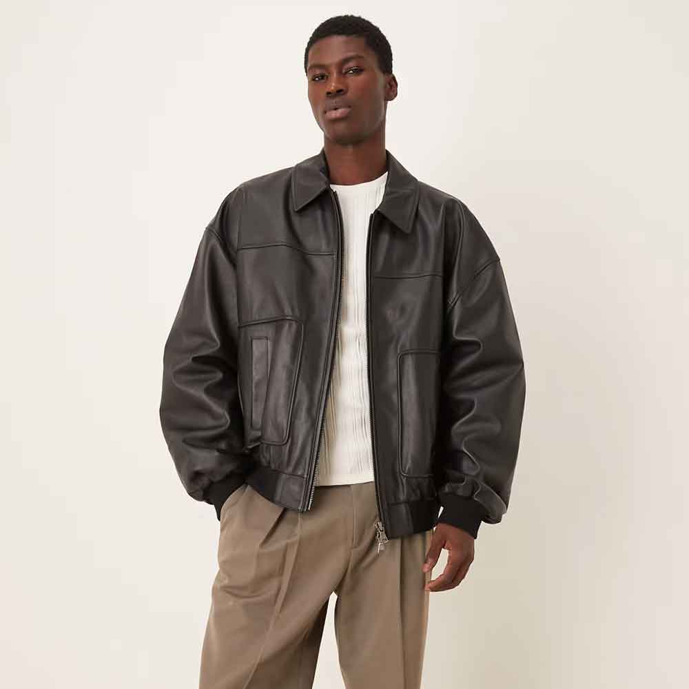 a model wearing an Oversized Leather Bomber Jacket