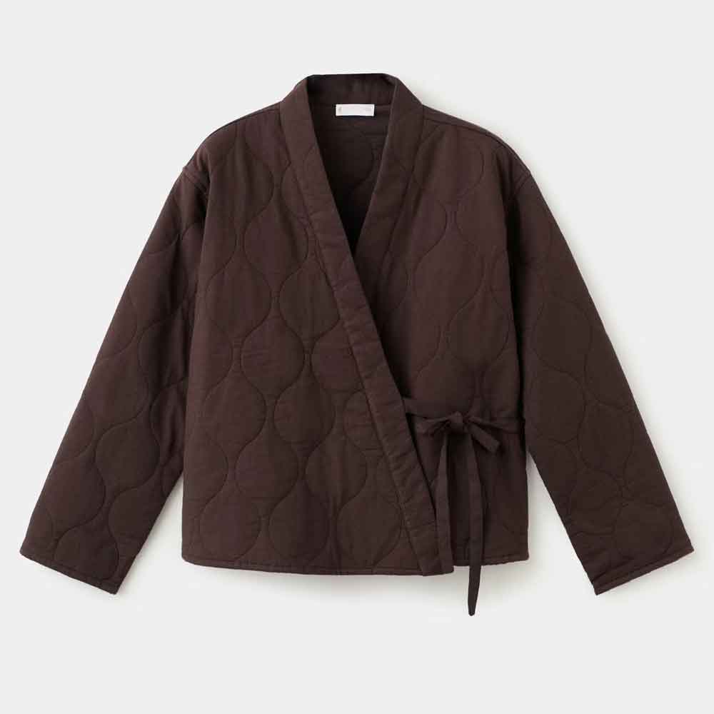 A dark brown quilted wrap jacket with a tie waist, laid flat against a light gray background.