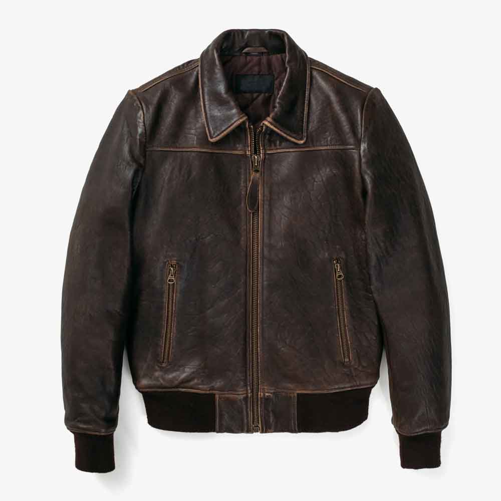 A dark brown Vintage Leather Flight Jacket with contrast stitching, a front zipper, and zippered hand pockets, shown against a plain light gray background.