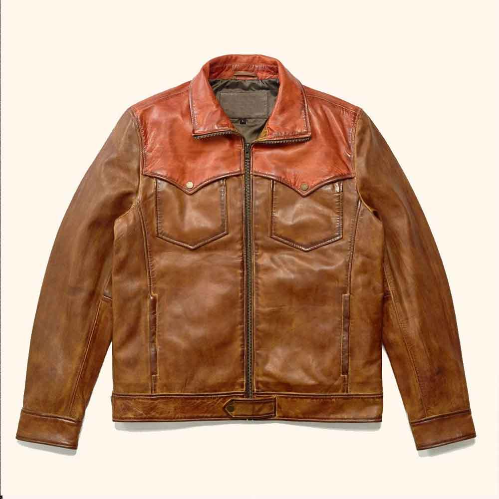 A brown leather jacket with a contrasting reddish-brown collar and yoke, featuring a front zipper, two chest flap pockets, and side slip pockets, laid flat against a light cream background.