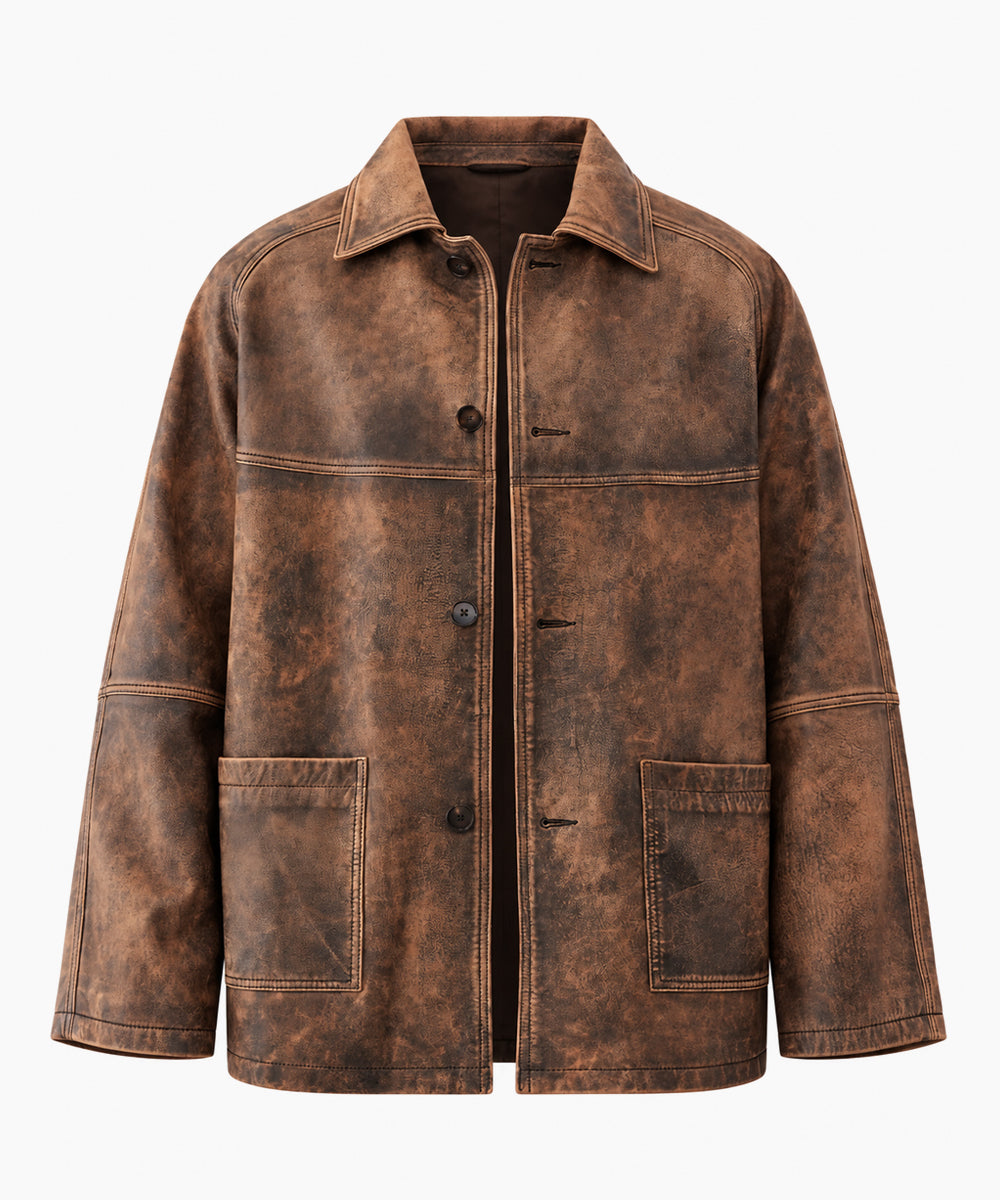 A distressed brown leather jacket with a vintage, weathered finish, featuring a button-up front, pointed collar, and two large front patch pockets, shown against a plain white background.