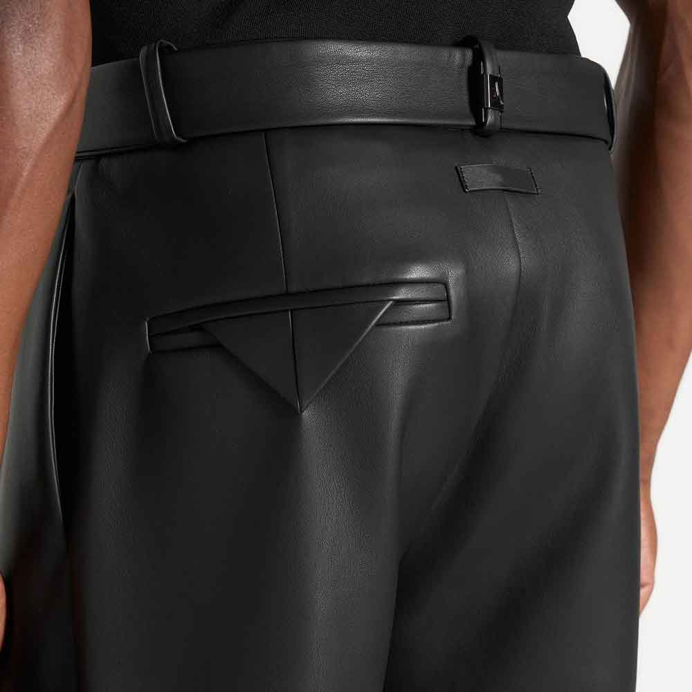 back view of a black leather pants